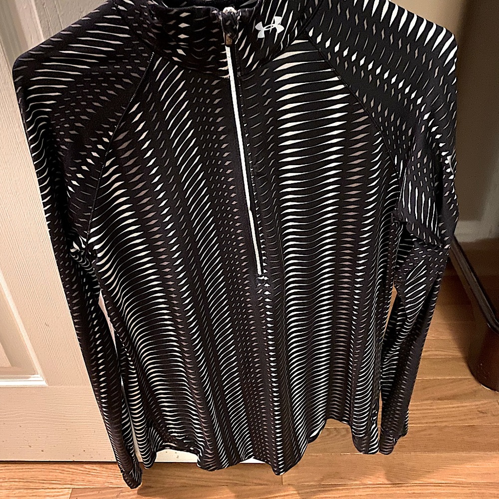 Half zip under armour. Gently used.